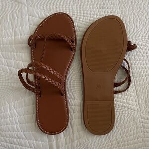 Brown sandals.